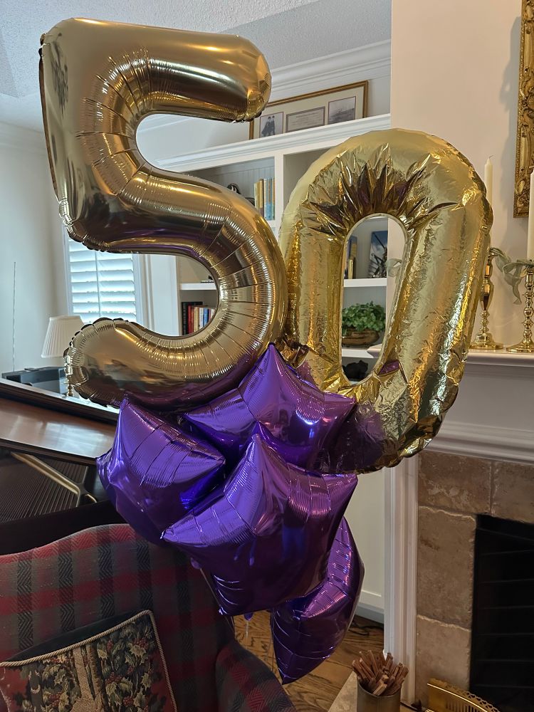 Balloons spelling out “50”