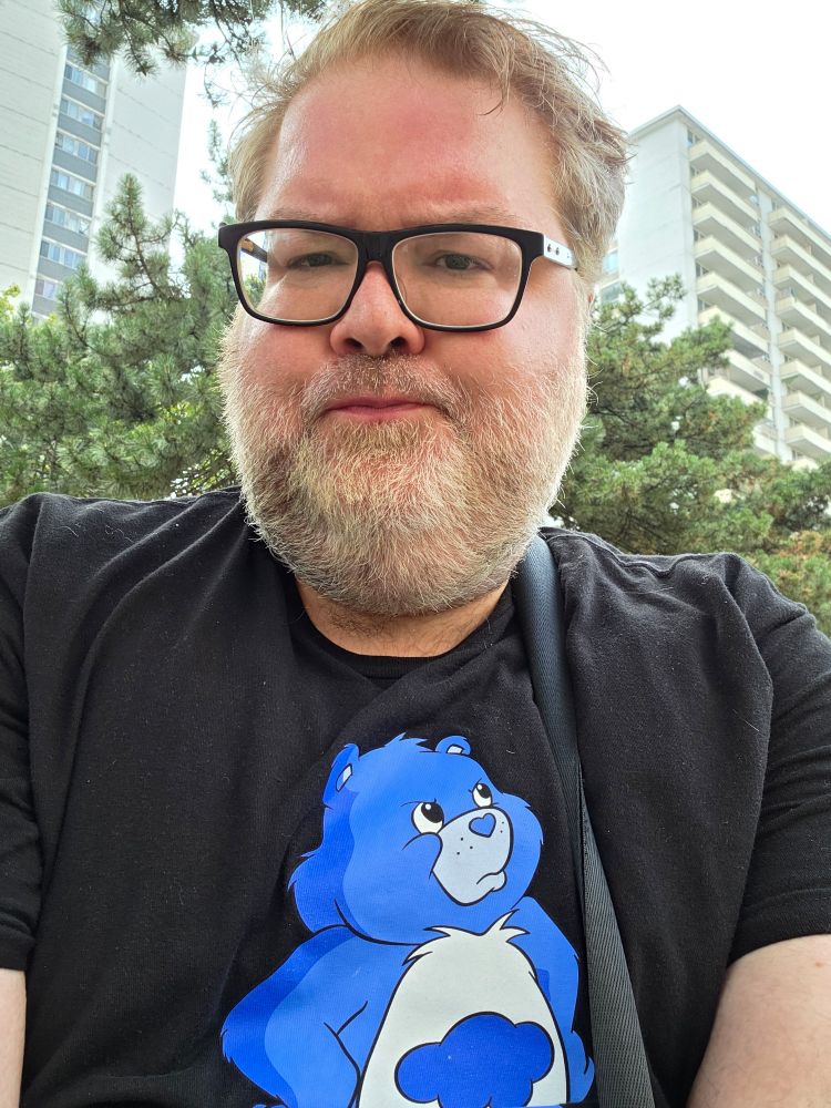 Frowning in my Grumpy Bear shirt