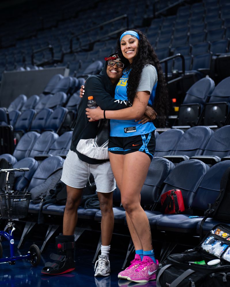 Diamond DeShields and Kamilla Cardoso hug