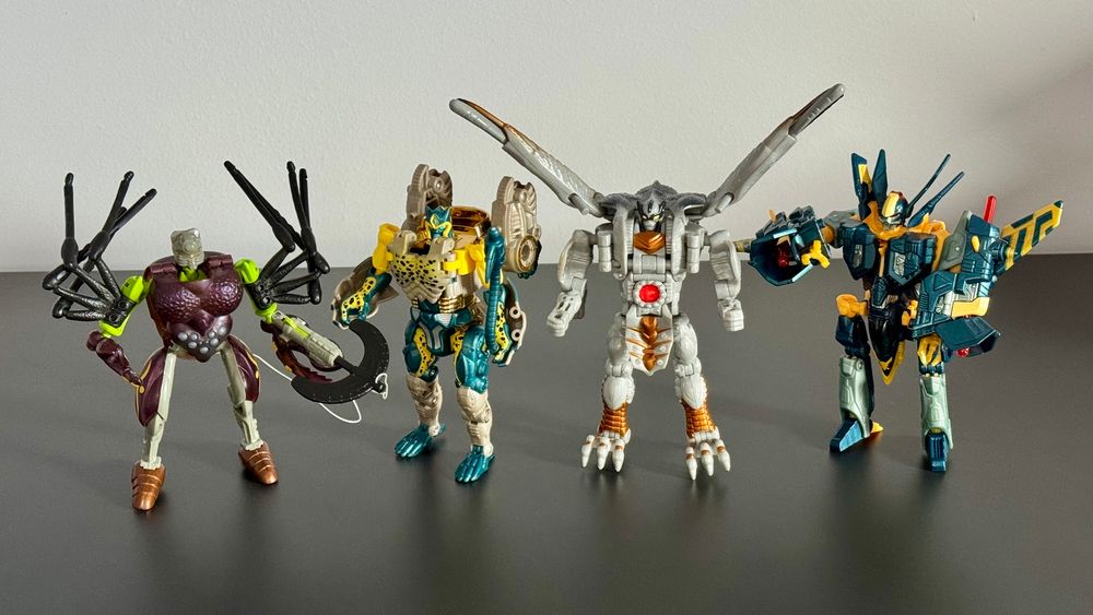 Transformers Beast Wars Tarantulas, Transmetal Cheetor, Fuzor Silverbolt, and Beast Machines Jetstorm toys in their robot modes.