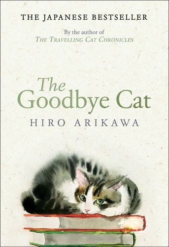Cover of "The Goodbye Cat" by Hiro Arikawa. Artwork features a calico cat curled up on a pile of books and looking directly at the reader. 