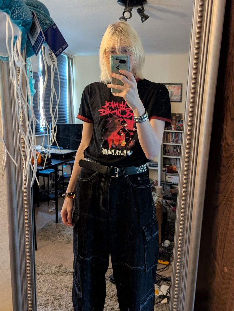 Merle dressed like he's gonna be an extra in a BFMV music video.