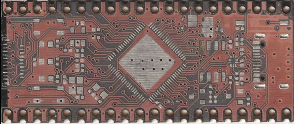 Scanned PCB, showing off solder mask and silk layer removed by laser.