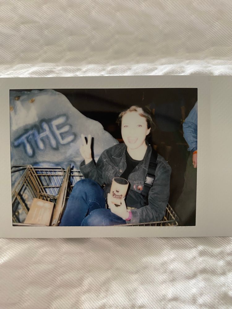 Photo of a photo of a survivor in a shopping cart