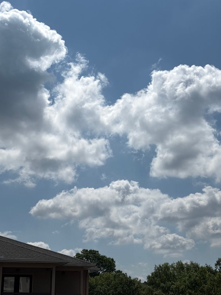 A photo of clouds with a blue sky