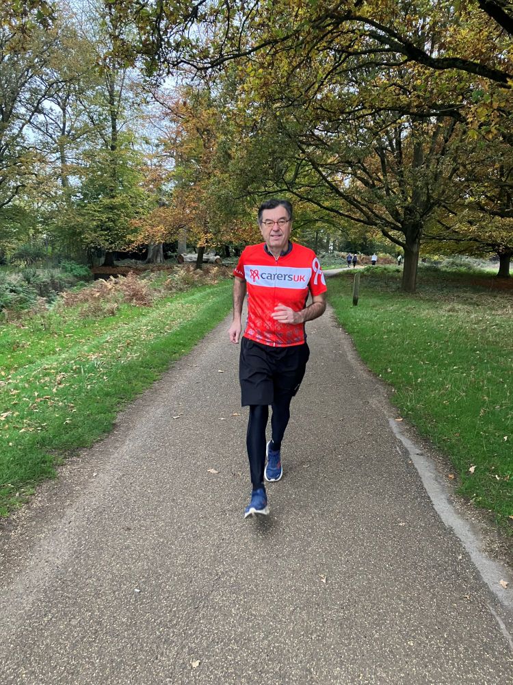 Chair of Carers UK Nick Baird running in a Carers UK t shirt 
