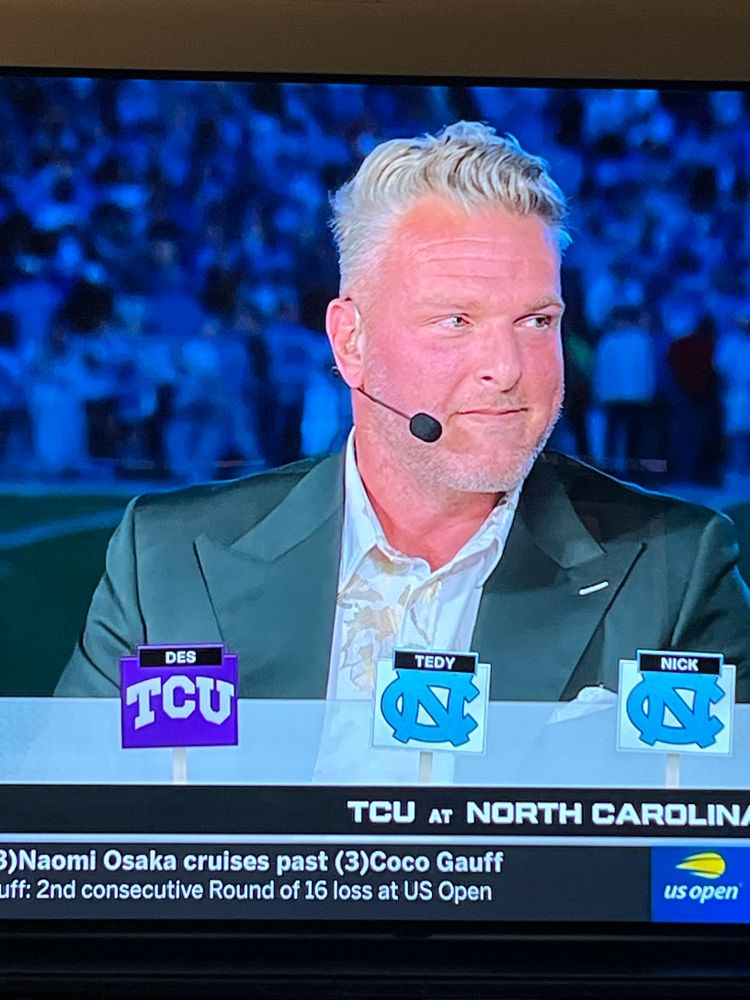 The gaping ass hole that is Pat McAfee actually wearing a collared shirt despite being horribly garish. 