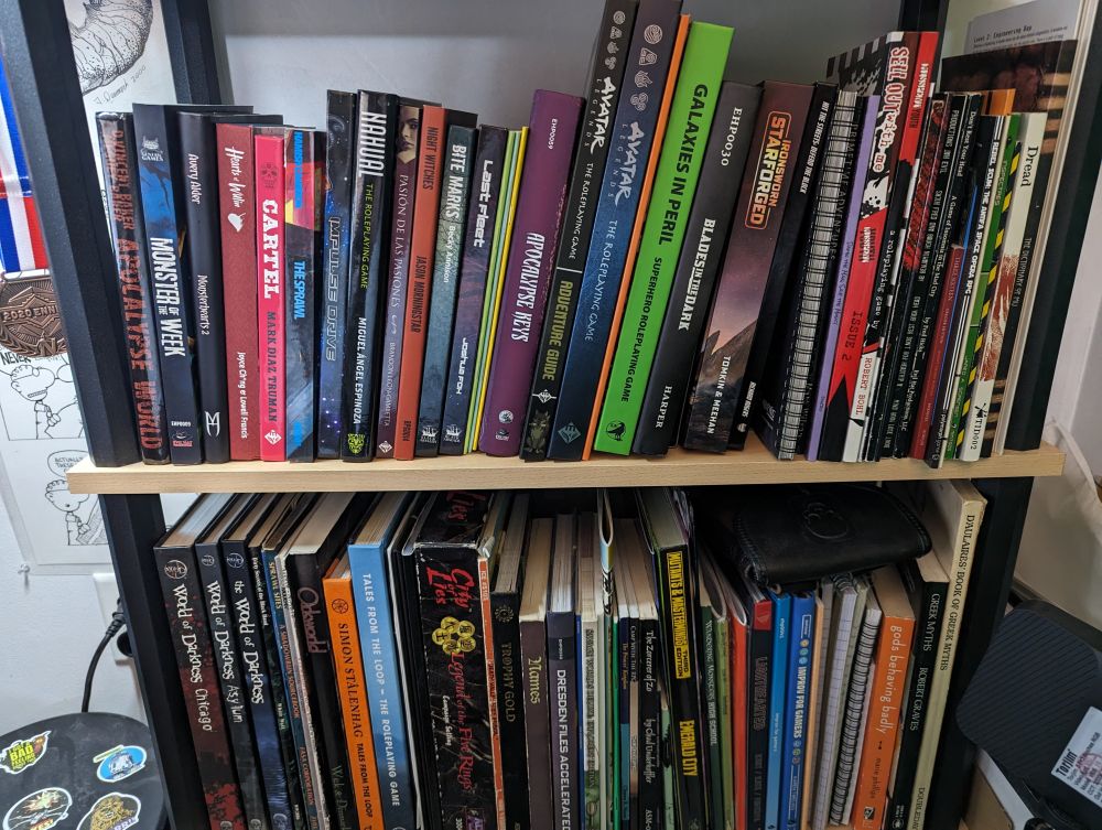 a pic of Rich's small dead tree RPG collection
