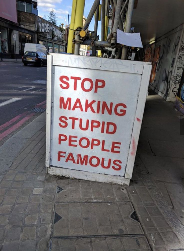 Street sign "Stop making stupid people famous"
