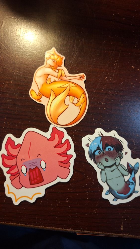 Three standalone stickers:

Denki as an elegant golden merm.

Blushing cutesy Todorokoi.

Kouda-as-axolotl shocked face. 