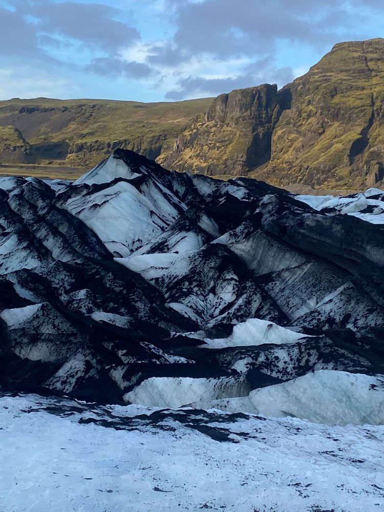 Glacier covered in volcanic ash