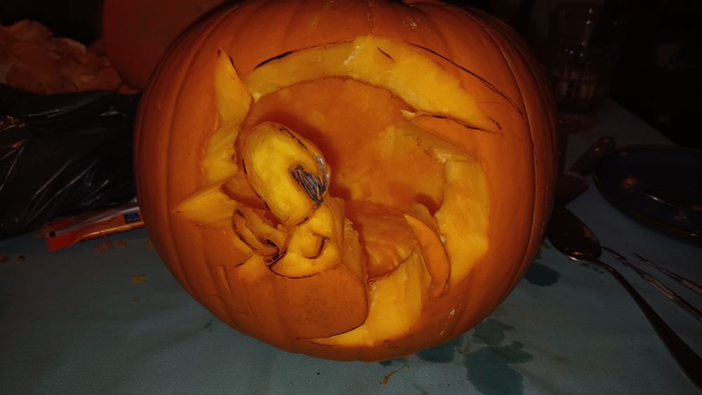 Finished pumpkin of sonic symbol, taken with camera flash on and no candle inside. 