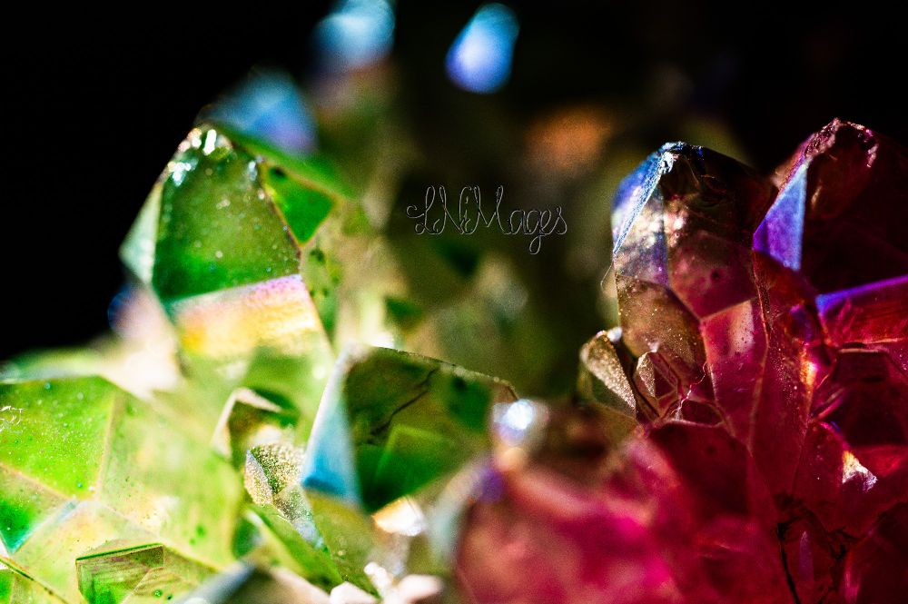 Macro image close up of green and pinkish red dyed quartz crystals