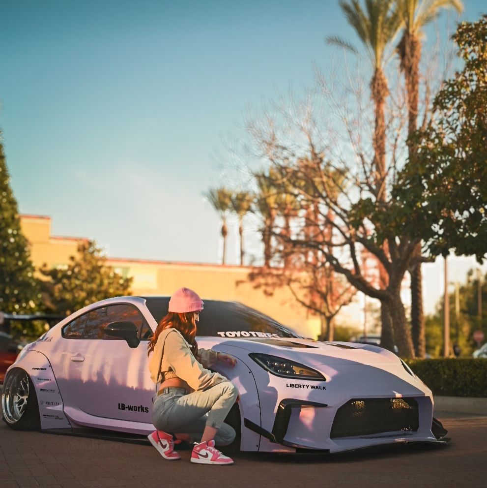 Image of a woman kneeling next to her car at a car show in Southern California 

#portraitpgotography #portrait #fineart #fineartphotography #widebody #model #modeling #carmodel #carphotographer #eventphotography