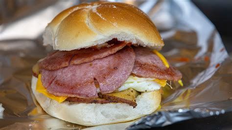 A porkroll, egg, and cheese sandwich on a Kaiser roll