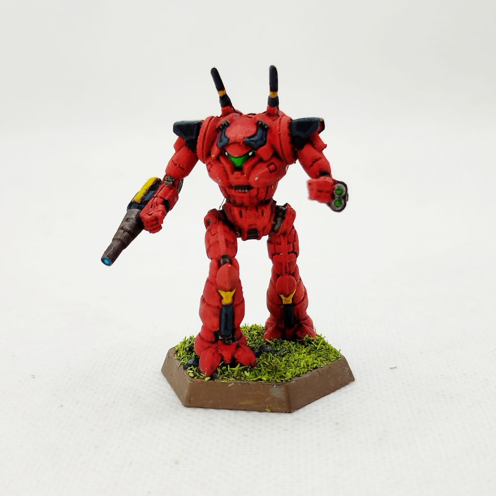 Foto de la miniatura de un Wraith de battletech sobre un fondo blanco.

Se trata de un mecha de forma humanoide pero silueta baja respecto a la posición de la cabeza, que tiene un visor para la cabina  en forma de "té" y lleva protección adicional que simula la forma de un casco samurái. Dos antenas salen de su espalda y va armado con un láser grande y dos láseres medios.

Está pintado de rojo con acentos en negro y amarillo. El cristal de la cabina es de un verde neón.