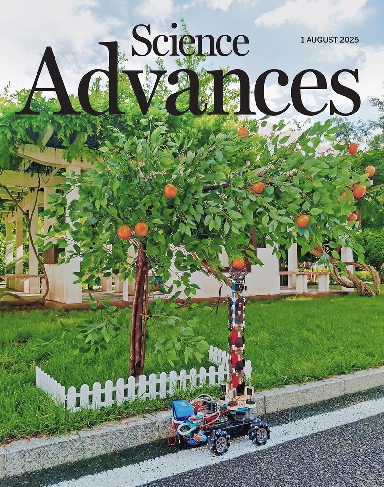 An unmanned vehicle uses an exoskeleton-enhanced arm to pick fruit. 