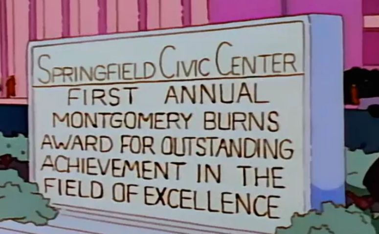 Simpsons made up award sign 