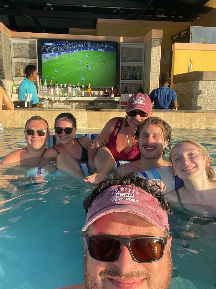 Man City fans in St. Kitts & Nevis watching from the swim up bar