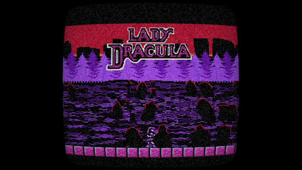 a crt screen with the text lady dracula on screen, in the background is a forest, then a graveyard, then in the center of the screen is a purple woman. The entire screen is very reminiscent of the first Castlevania and it's sequel.