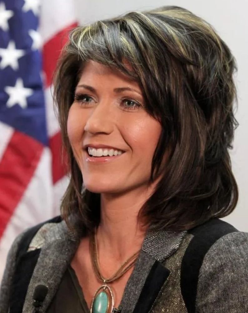 Kristi Noem a few years ago, looking remarkably like Maggie Gyllenhaal, which I understand if you rely on this to know an image isn't helpful, but she's a brunette woman with a heart of gold.