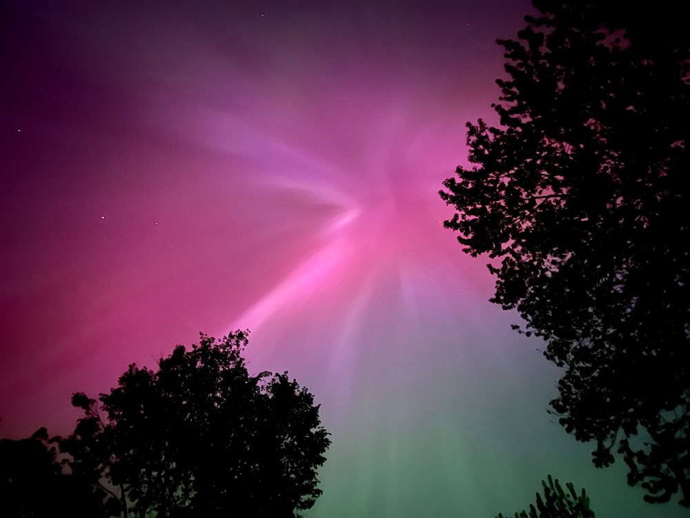 Pink and green northern lights from 2024’s historic geomagnetic storm.