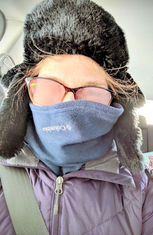 I don’t remember how cold it was. Winter ensemble of flappy hat, neck thingy, and one of those cool ass reflect-y coats. Complete with fogged glasses and hair breakage.