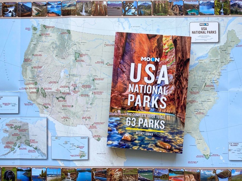 The book "Moon USA National Park" is set on top of the foldout US map that locates all parks.