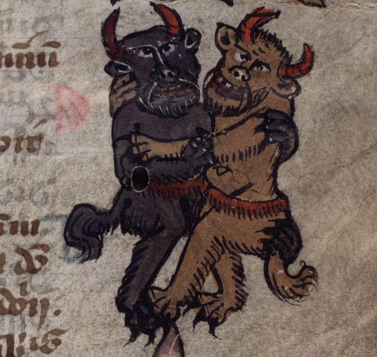 Two devils embrace in the margins of Corpus Christi College Cambridge MS 180 f. 1r