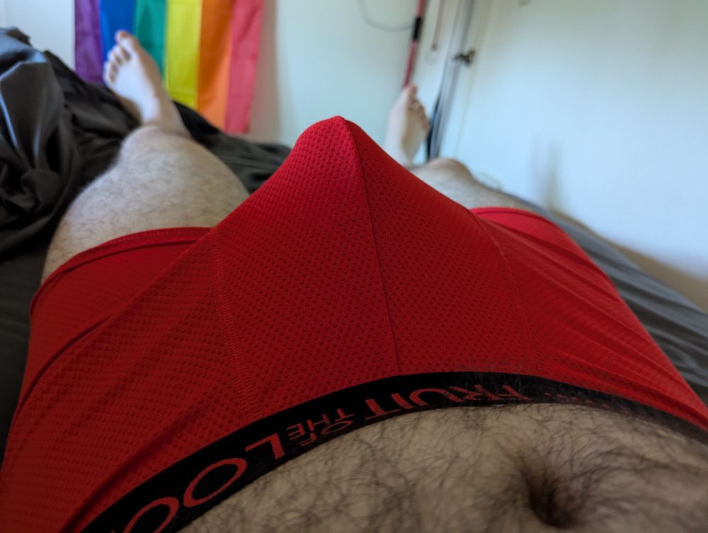 Red boxer shorts with a big bulge