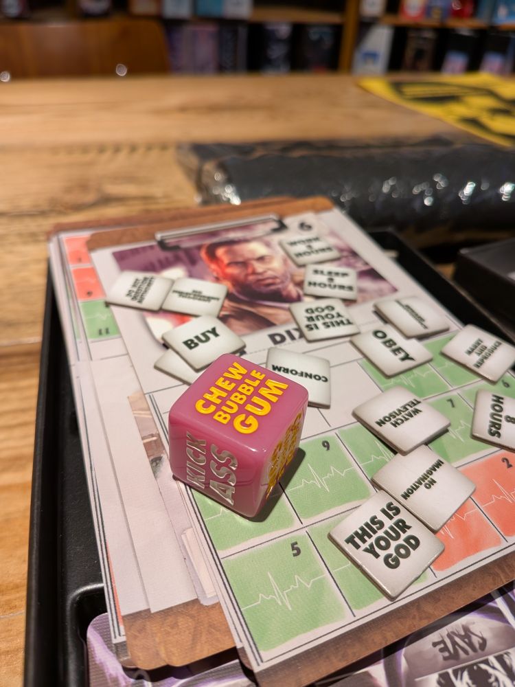 Terning med "Kick Ass" og "Chew Bubble Gum"