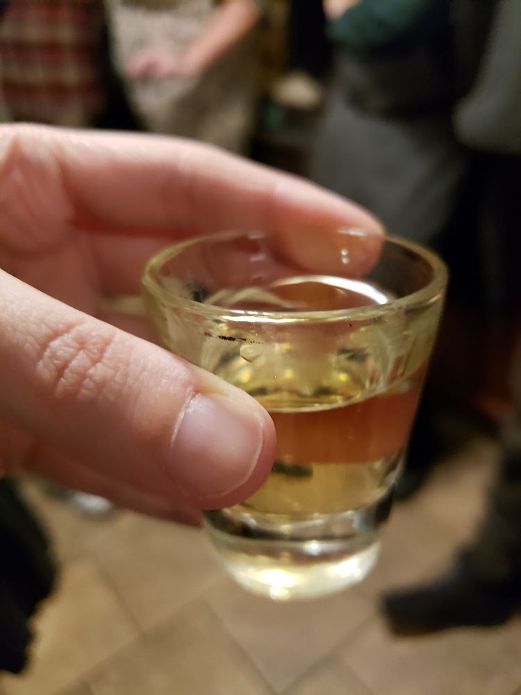 a shot of Malort at a party
