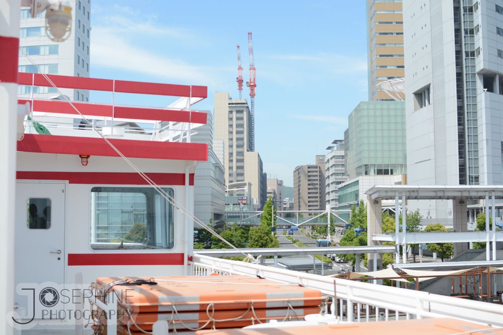 buildings at the port in takamatsu taken from a ferry 