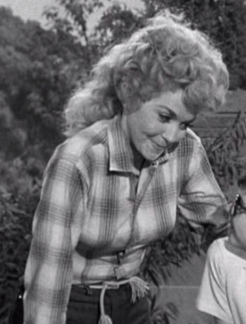Donna Douglas as Elly May Clampett.