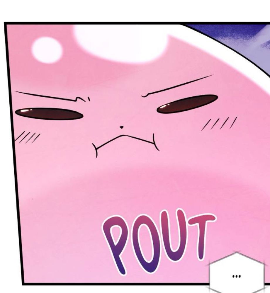 A pink round creature pouting.