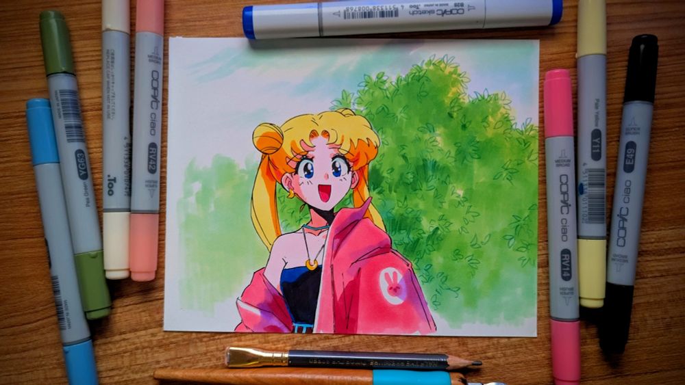 usagi from sailor moon, an anime girl with two long blonde pigtails, is smiling and wearing an oversized pink jacket. she's in front of large trees and an overcast sky