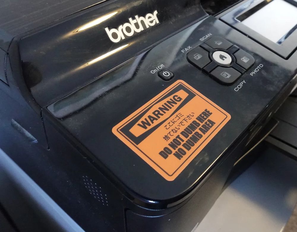Brother printer with AvE die cut vinyl decal "no dumb area"