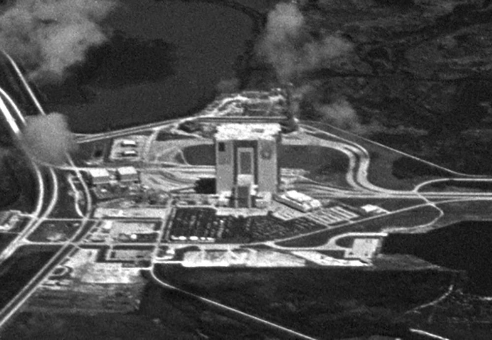 A declassified KH-9 HEXAGON spy satellite image of Florida's Space Coast on July 21, 1978. The scene shows an awesome high off-nadir view of Florida's Space Coast including NASA's VAB, a Saturn V rocket display, and more.