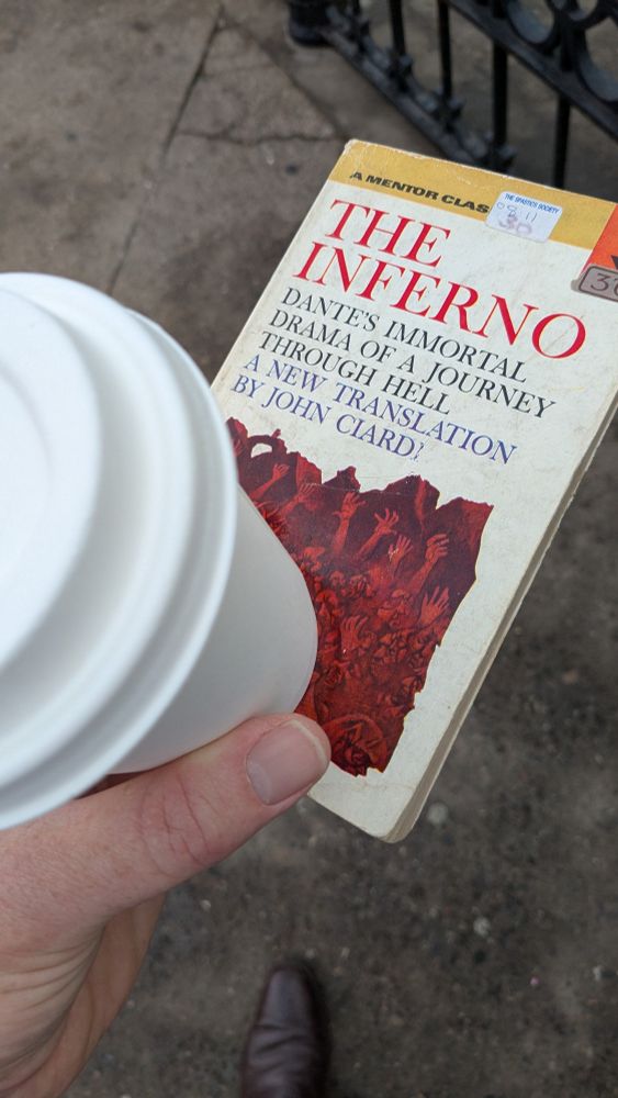 Cover of Dante's The inferno with a cup of coffee
