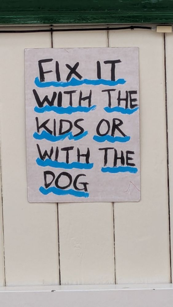 Poster stating " fix it with the kids of the dog"