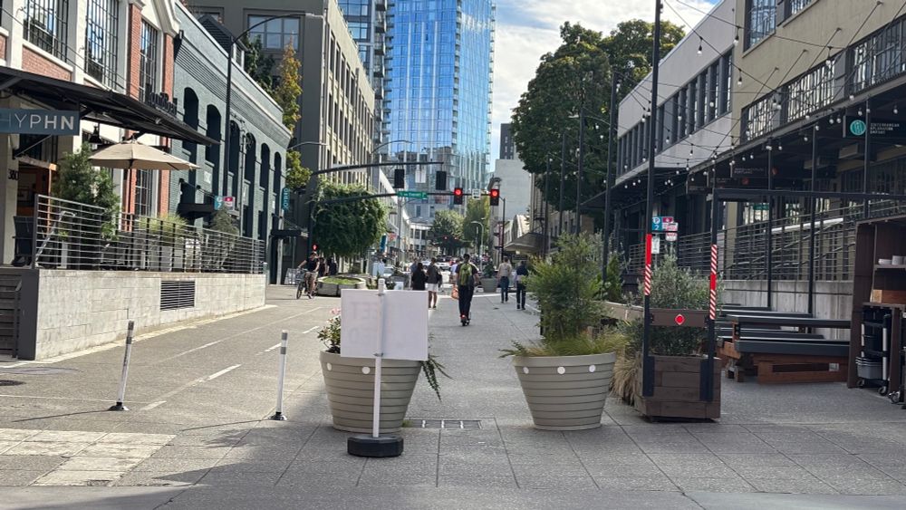 A view from downtown Portland. Pedestrians walk through a small shopping area. No signs of unrest. Taken 9/27/2025