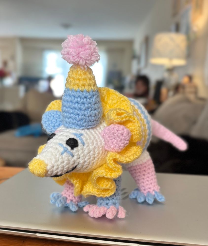 a clown opposum crocheted by sids wife 