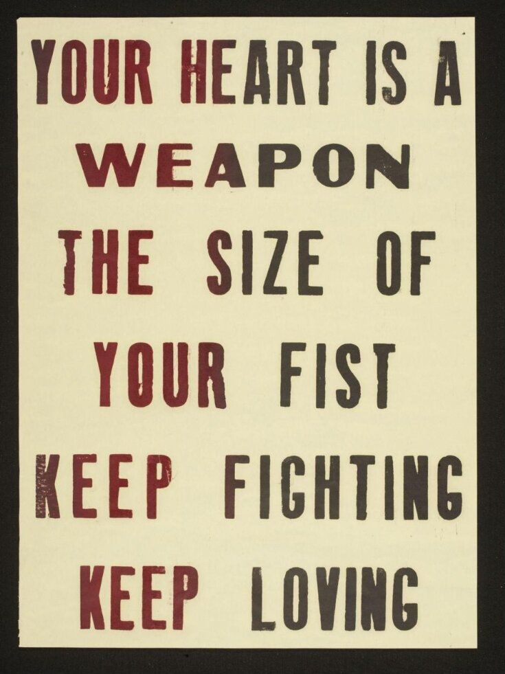 Poster reading "Your heart is a weapon the size of your fist. Keep fighting, keep loving"