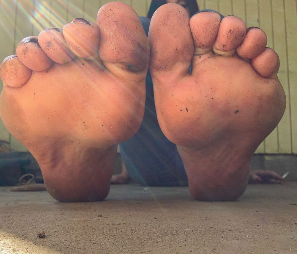 Close up pov of Meli’s dirty feet