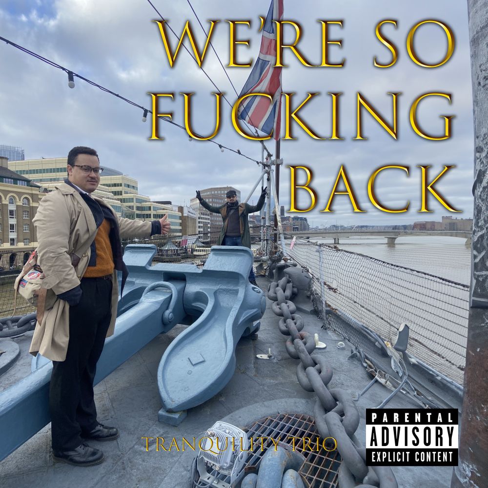 A photo of John Concagh standing in the bow of HMS Belfast with the words ‘We’re so fucking back’