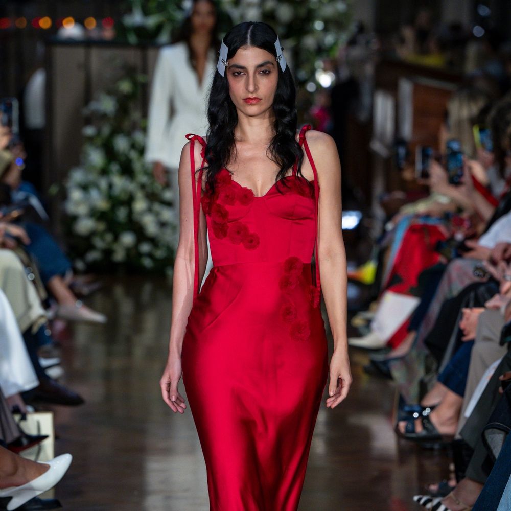 Model wearing a colourful fashion piece created in collaboration between DyeRecycle and Patrick McDowell at London Fashion Week, supported by Imperial College London.