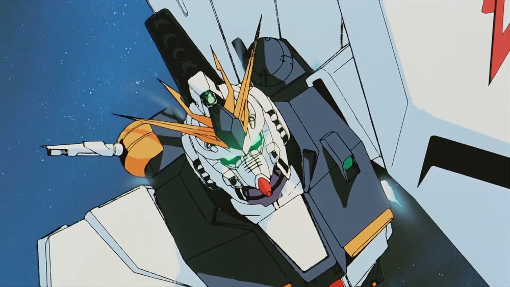 nu gundam flying at the screen