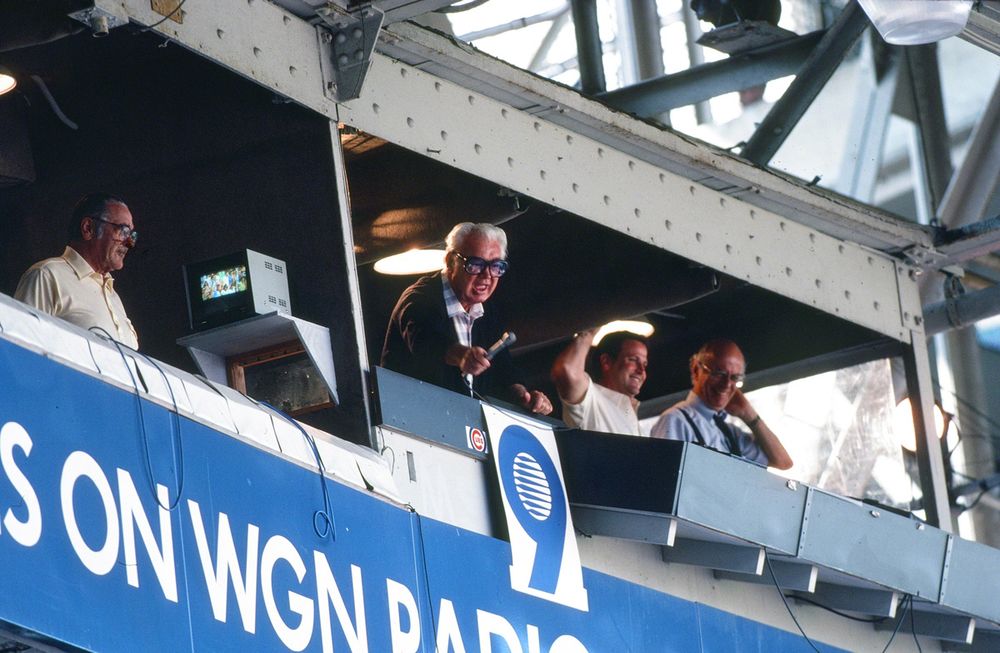 WGN announcer Harry Caray leads the crowd in "Take Me Out to the Ball Game" during the 7th Inning Stretch at Wrigley Field. #HumansOfBlueSky #HarryCaray  © 1988 Bob Soltys All Rights Reserved
