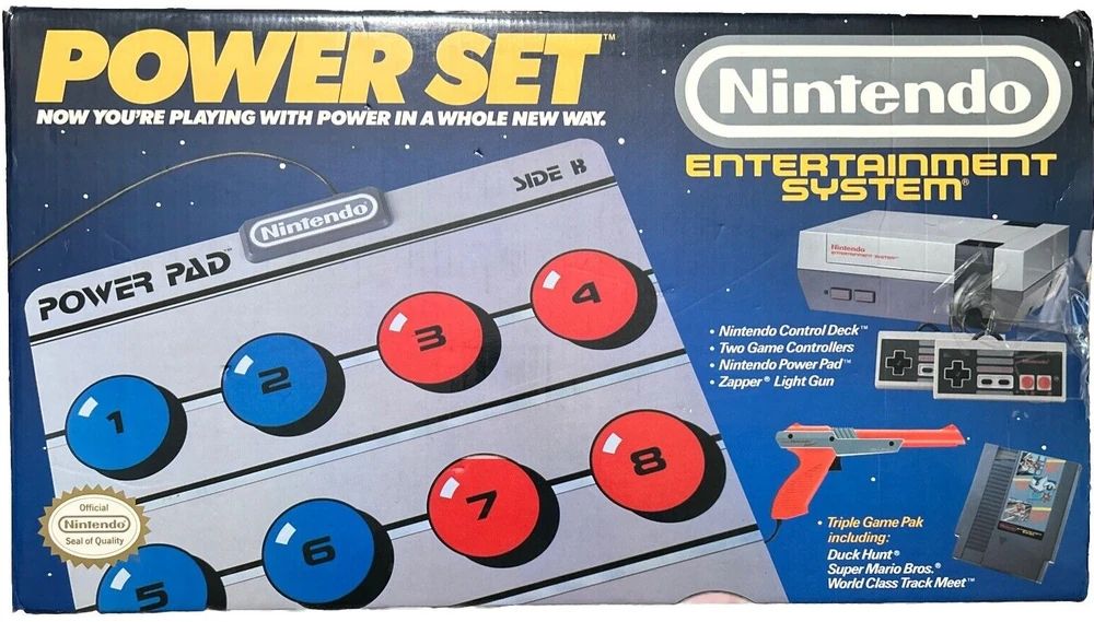 The box for a Nintendo Entertainment System bundle that included the console, two controllers, a light gun, a power pad, and a cartridge with three games (Super Mario Bros., Duck Hunt, and World Class Track Meet).

Photo is from the internet and not mine.
