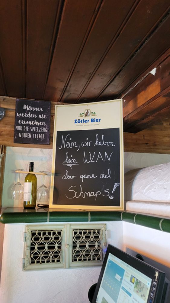 Sign saying "No WiFi but lots of Schnaps"